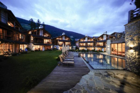 Отель Post Alpina - Family Mountain Chalets   Сан Кандидо